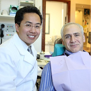 Dr. Tong and patient smiling